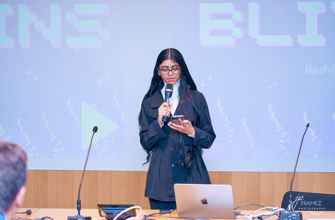 Student speaker at a live cohort presentation